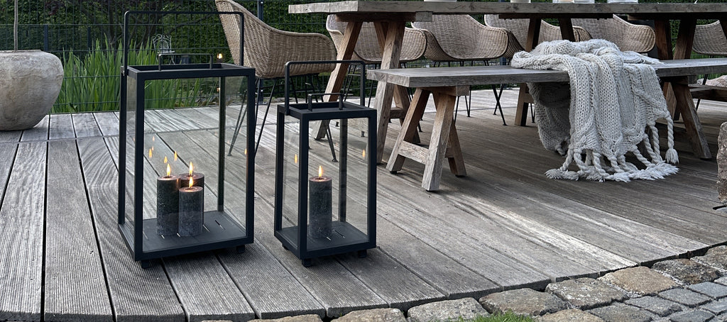 Outdoor black lanterns with multiple grey candle lights