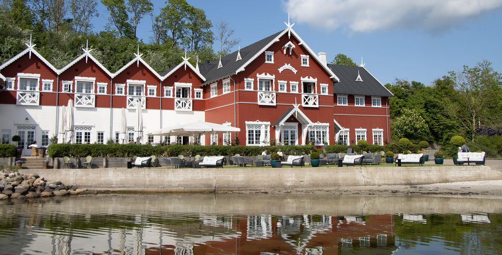 Danish Dyvig Badehotel. Beautiful hotel in a red and white historical building with sea view