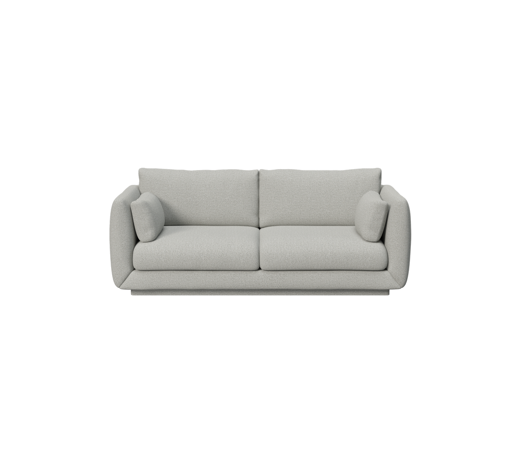 Light grey sofa with minimalistic design and rounded cushions.
