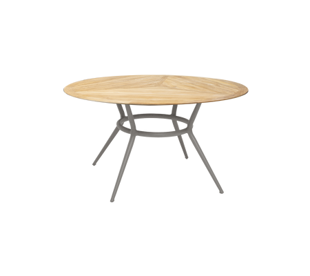 Round wooden table with a light wood finish and sturdy grey legs, offering a modern and stylish design for various settings.