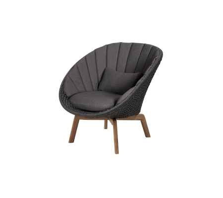 Stylish circular chair with plush cushioning and sleek wooden legs, featuring a textured upholstery for comfort and elegance.