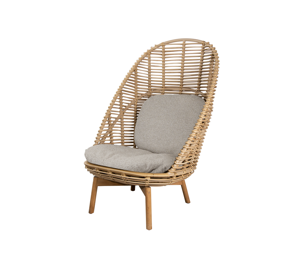 Woven chair featuring a light wood frame and a soft, cushioned seat, designed for comfort and style in various settings.