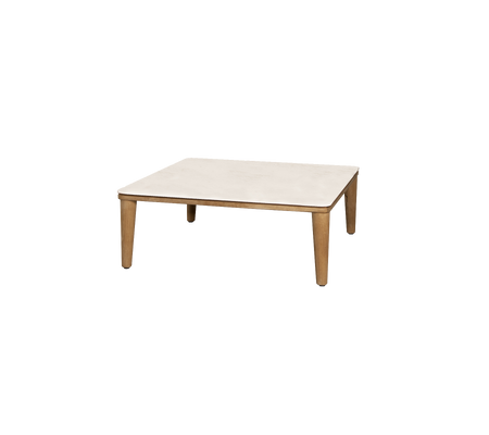 Square table with a light-colored top and wooden legs, offering a minimalist design suitable for various settings.