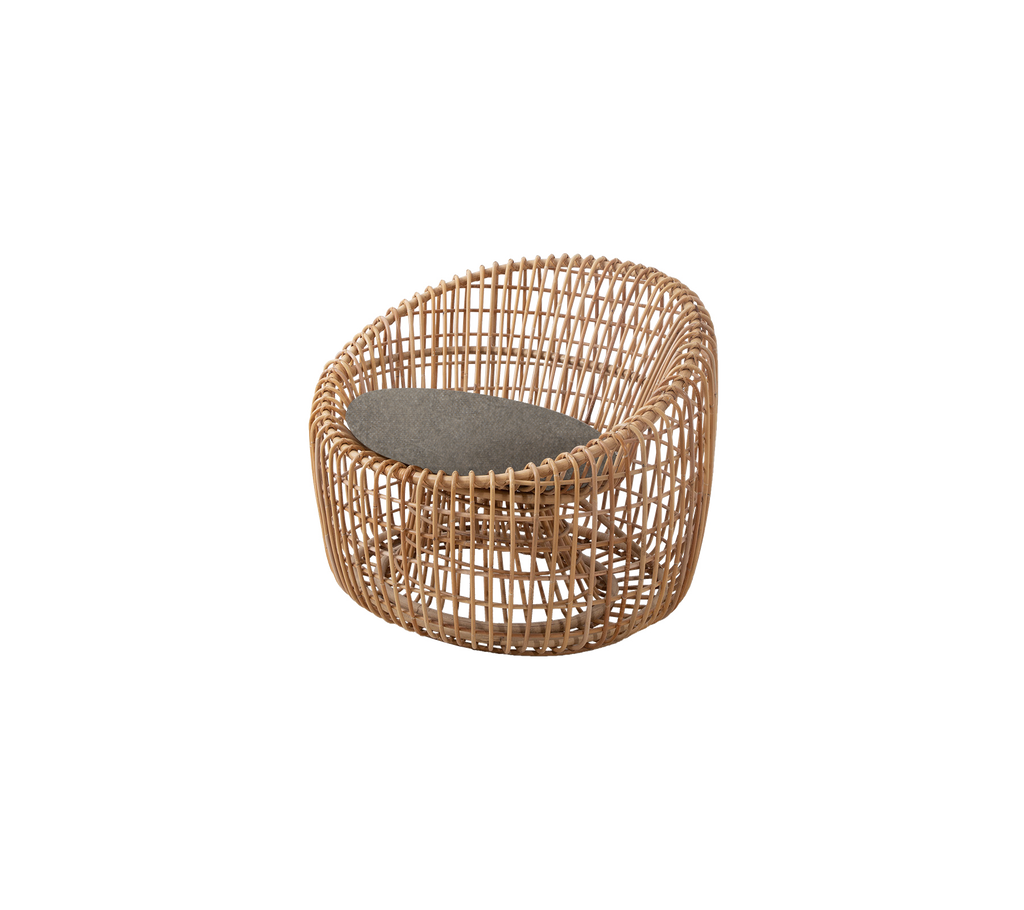 Woven chair with a rounded design and a soft cushion, featuring a natural finish and elegant appearance. Ideal for stylish seating.
