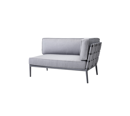 Modern gray lounge chair with a sleek design and woven backrest, perfect for stylish seating in various settings.