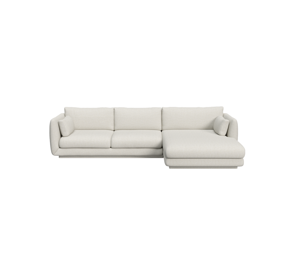 Modern sand sectional sofa with plush cushions.