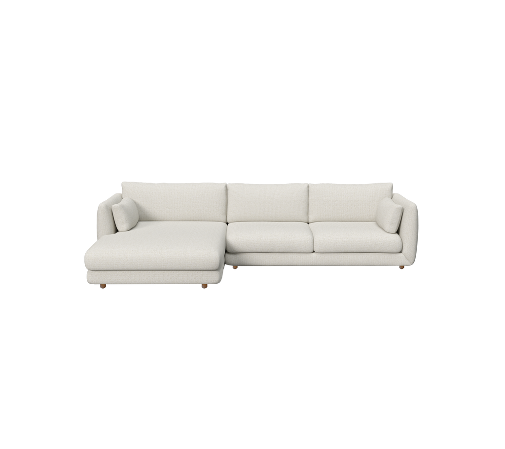 Modern sand-colored sofa in a minimalist lounge setting.