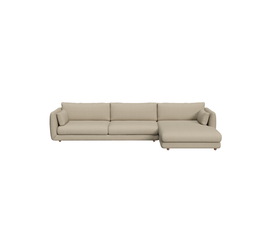 Brown sectional sofa in a modern lounge setting.