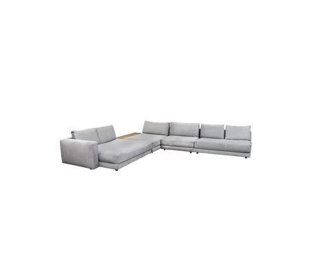 Modern L-shaped sectional sofa in light gray upholstery, featuring spacious seating and clean lines for a contemporary look.